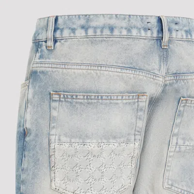 Amiri Stack Distressed Slim-leg Jeans In Blue
