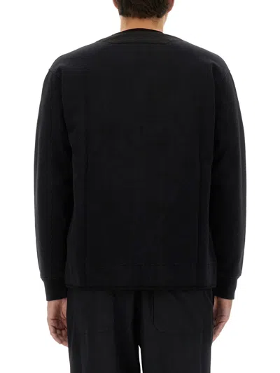 C.p. Company Zip Sweatshirt With Button And Patchwork In Black