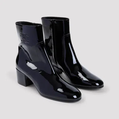 Celine Women Patent Leather Boots With Engraved Triomphe Logo In Black