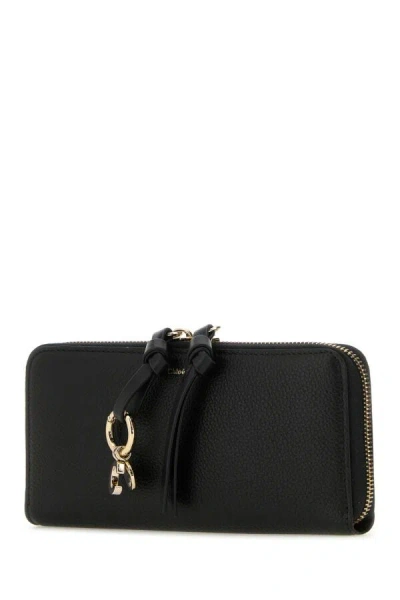 Chloé Leather Wallet With Gold-tone Hardware And Tassel Accent In Black