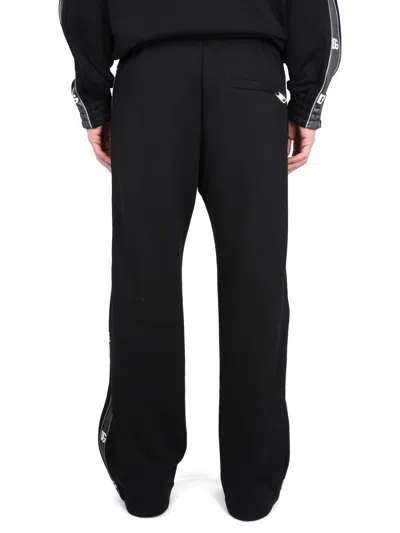 Dolce & Gabbana Jogging Pants With Logo Bands In Black