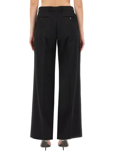 Dolce & Gabbana Flared Wool Pants In Black