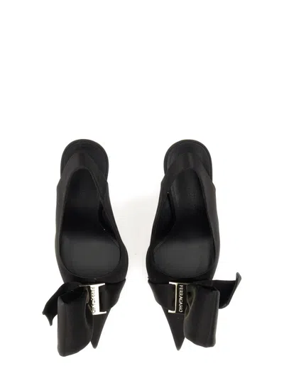 Ferragamo Asymmetrical Bow Sandal In Black