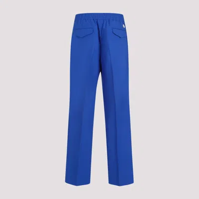 Gucci Brand-embroidered Slip-pocket Straight-leg Regular-fit Wool-blend Trousers In Blue