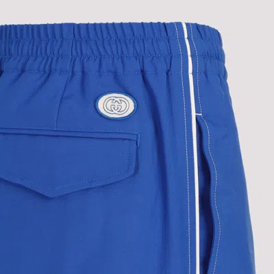 Gucci Brand-embroidered Slip-pocket Straight-leg Regular-fit Wool-blend Trousers In Blue