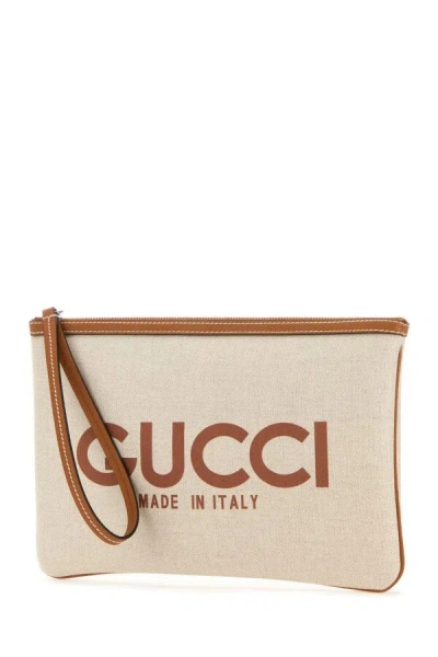 Gucci Logo-print Leather-trim Canvas Clutch In Brown