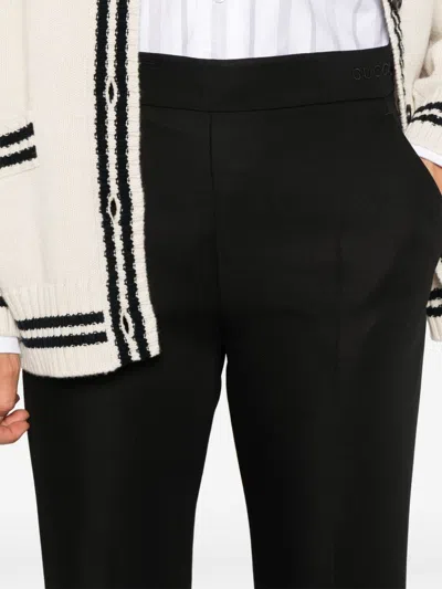 Gucci Mid-rise Flared Trousers With Embroidered Logo In Multicolor