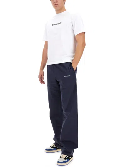 Palm Angels Men Pants With Logo In Blue