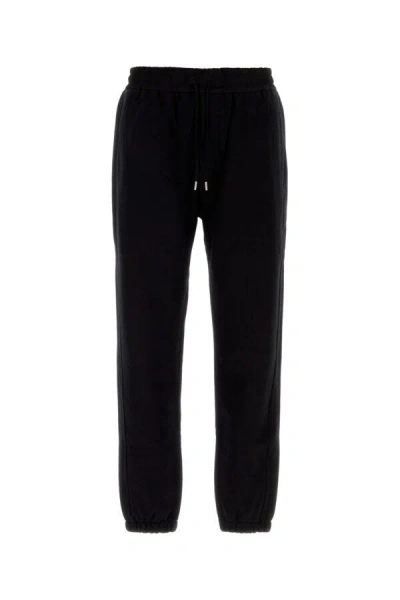 Saint Laurent Glossy-finish Track Pants In Black