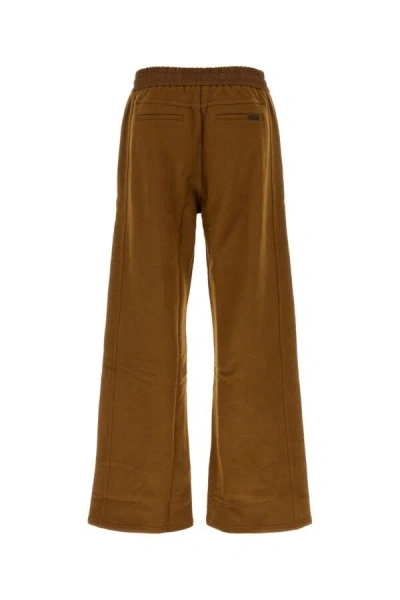 Saint Laurent Cotton Joggers With Back Pockets And Elastic Waistband In Brown