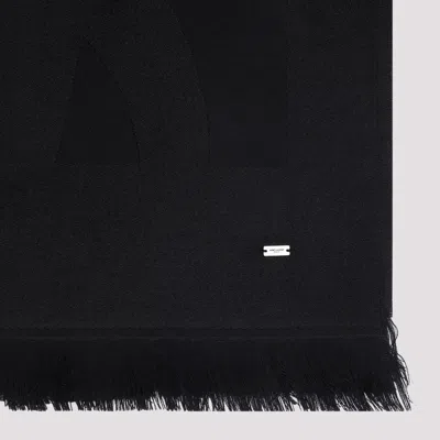 Saint Laurent Wool Scarf With Fringed Trims And Subtle Pattern In Black