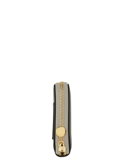Stella Mccartney Zipped Wallet With Circular Logo And Gold Hardware In Black