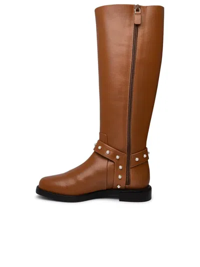 Stuart Weitzman Leather Pearl Moto Boots In Brown