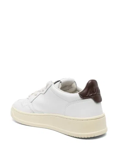 Autry Medalist Low Sneakers In White And Navy Blue Leather In Leat/leat Wht/brown