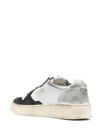 Autry Black And White 'medalist' Low Top Sneakers Distressed Effect In Cow Leather In Leat/leat Wht/blk/sil