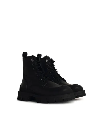 Moncler Leather Boots With Engraved Logo In Black