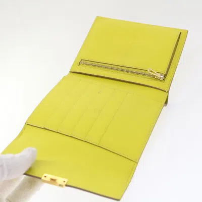 Pre-owned Hermes Hermès Clic 12 Yellow Leather Wallet  ()