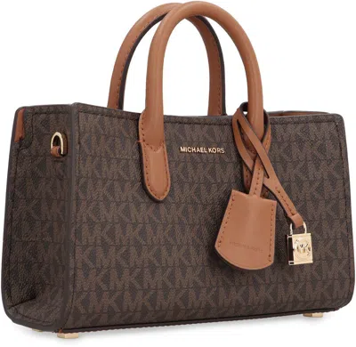 Michael Kors Handbags. In Brown