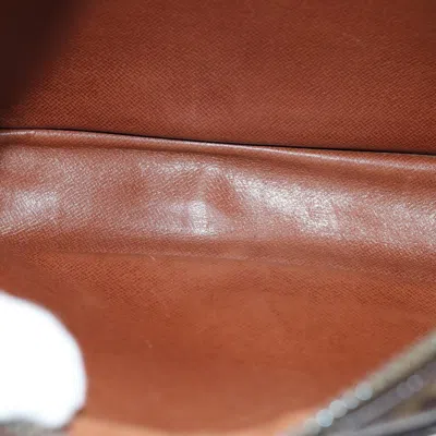 Pre-owned Louis Vuitton Trousse De Toilette Brown Canvas Clutch Bag ()