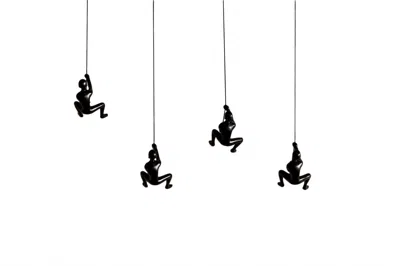 Homezia Set Of Four 6" Black Resin Unique Climbing Men Wall Decor