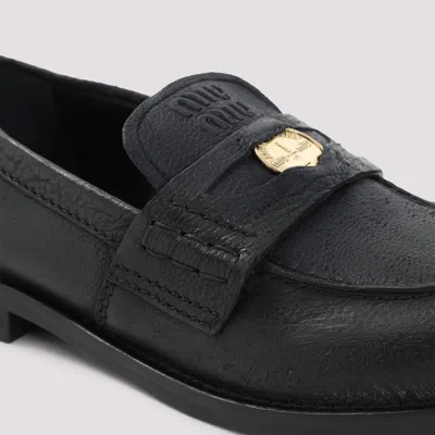 Miu Miu Round Toe Leather Loafers With Rubber Sole In Black