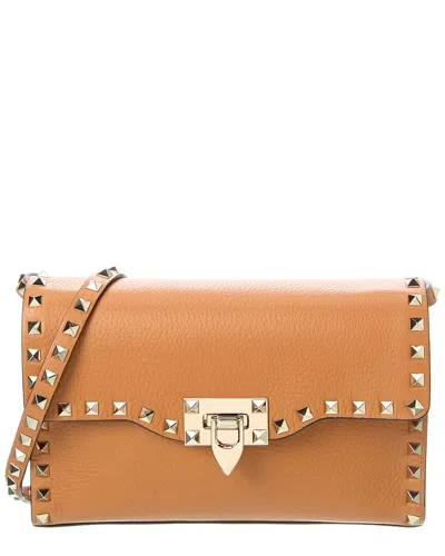 Valentino Garavani Rockstud Small Grainy Leather Crossbody In Brown