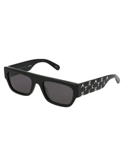 Stella Mccartney Sc0210s Sunglasses In 004 Black Black Smoke