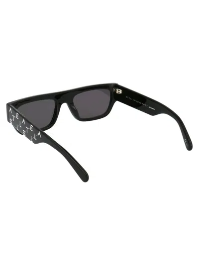 Stella Mccartney Sc0210s Sunglasses In 004 Black Black Smoke