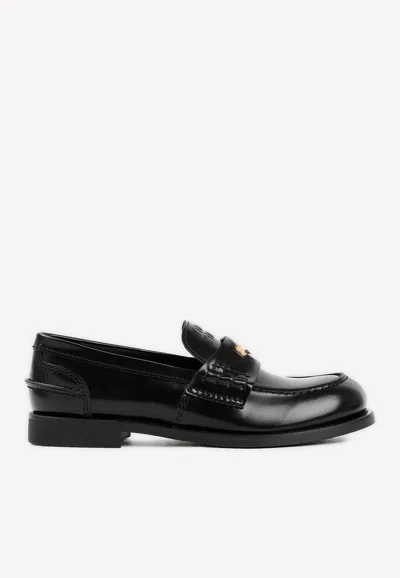 Miu Miu Logo Embossed Leather Loafers In Black