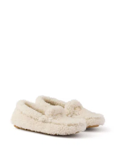 Prada Triangle Logo Shearling Loafers In Beige