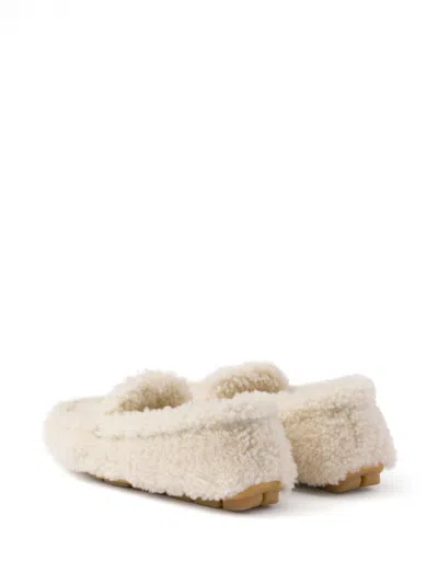 Prada Triangle Logo Shearling Loafers In Beige