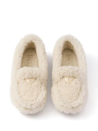 Prada Triangle Logo Shearling Loafers In Beige