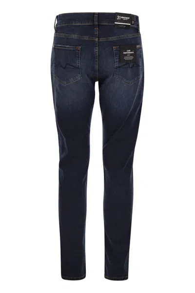 7 For All Mankind Slimmy Tapered Alto - Mid-rise Skinny Jeans In Navy
