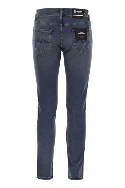 7 For All Mankind Slimmy Tapered Globe - Skinny Medium-waisted Jeans In Blue Denim