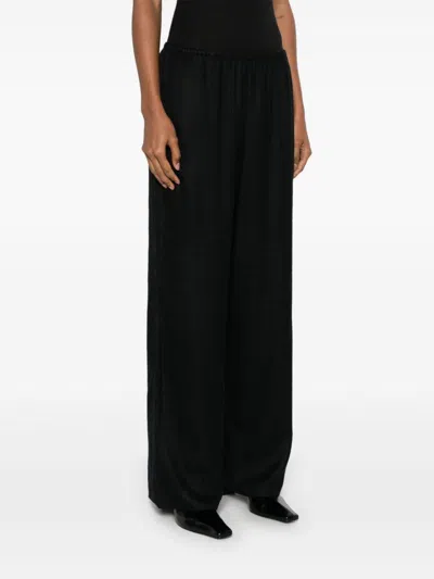 Totême Monogram Flannel Trousers In Multicolor