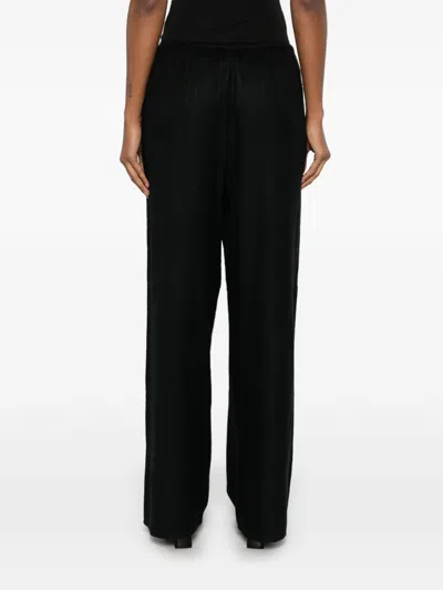 Totême Monogram Flannel Trousers In Multicolor