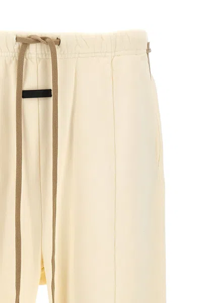 Shop Fear Of God Men 'forum' Trousers In Cream