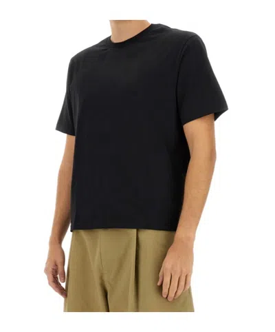 Studio Nicholson Lay Logo Detailed Crewneck T-shirt In Black