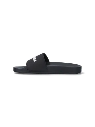 Balenciaga Logo-embossed Rubber Slides In Black