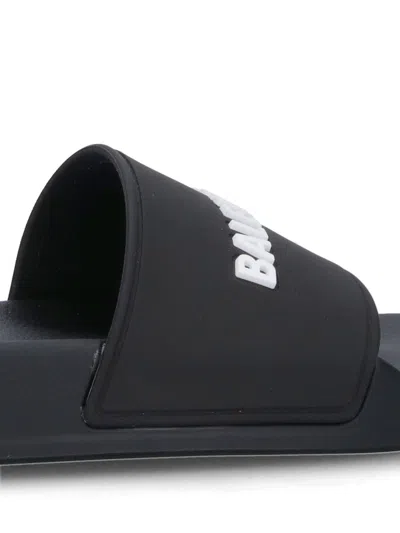 Balenciaga Logo-embossed Rubber Slides In Black