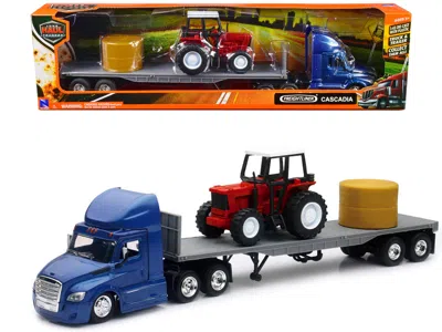 New Ray Freightliner Cascadia With Flatbed Trailer Blue With Farm Tractor Red And Hay Bales "long Haul Truck