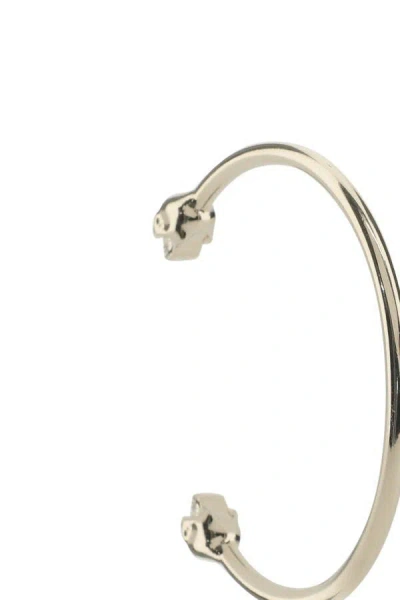 Alexander Mcqueen Women Gold Metal Twin Skull Bracelet In Gold