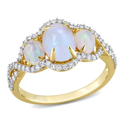Mimi & Max 1 1/4 Ct Tgw Oval Cut Ethiopian Blue Opal And 1/3 Ct Tw Diamond Halo 3-stone Ring In 10k Yellow Gold In Yellow