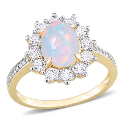 Mimi & Max 2 1/6 Ct Tgw Oval Shape Blue Ethiopian Opal And White Topaz And 1/10 Ct Tw Diamond Halo Ring In Yell In Yellow