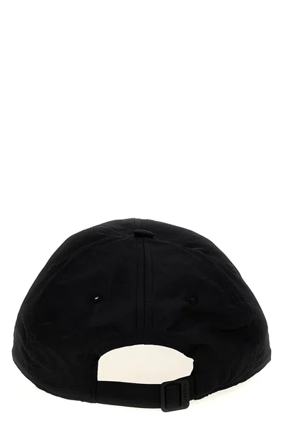 Jw Anderson Curved Peak Logo Embroidered Baseball Cap In Black