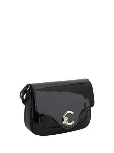 Coccinelle C-me Patent Shoulder Bag In Black