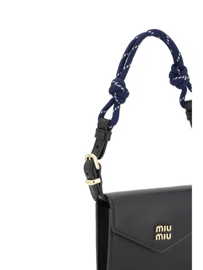 Miu Miu Rope Handle Wallet In Black
