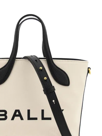 Bally Structured Bucket Bag With Dual Handles And Adjustable Strap In Black And White