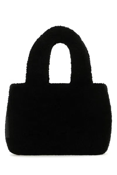 Amina Muaddi Shearling Handbag With Twin Handles And Structured Silhouette
