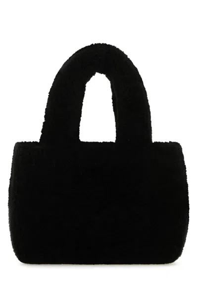 Amina Muaddi Shearling Handbag With Twin Handles And Structured Silhouette
